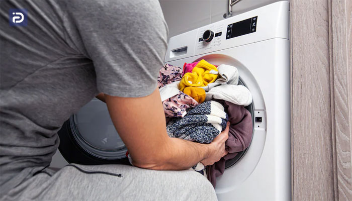 عوارض گذاشتن بیش از حد لباس در ماشین لباسشویی
