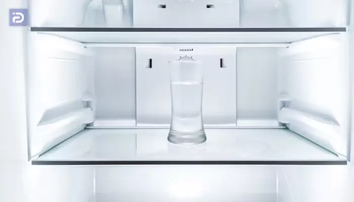استفاده از لیوان برای اطمینان از تراز بودن یخچال