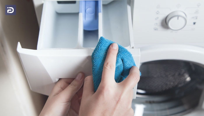تمیز کردن و جرمگیری جاپودری ماشین لباسشویی وست فراست
