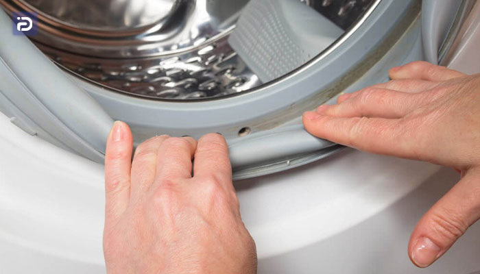 روش تمیز کردن لاستیک دور درب ماشین لباسشویی مابه