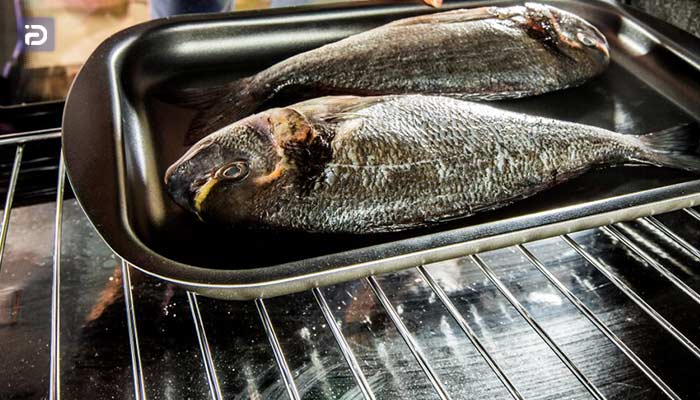 بهترین راه برای پخت ماهی در فر اجاق گاز کن