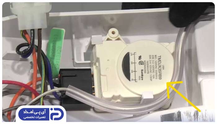 تست تایمر دیفراست (در مدل‌های قدیمی با تایمر مکانیکی) یخچال