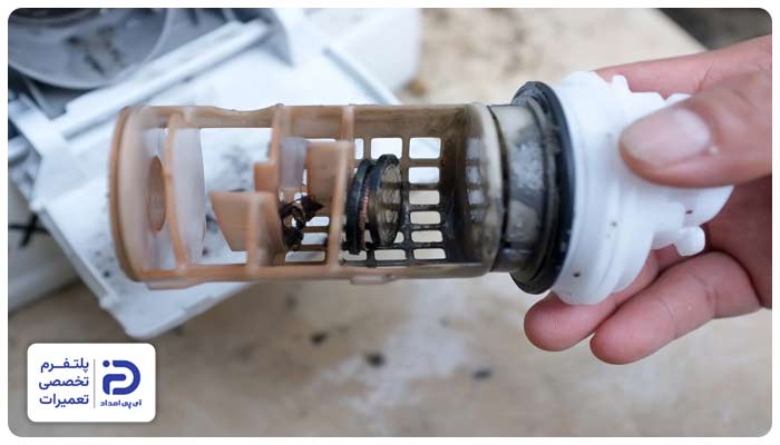 مسدود شدن فیلتر تخلیه از دلایل ارور e04 ماشین لباسشویی اسنوا